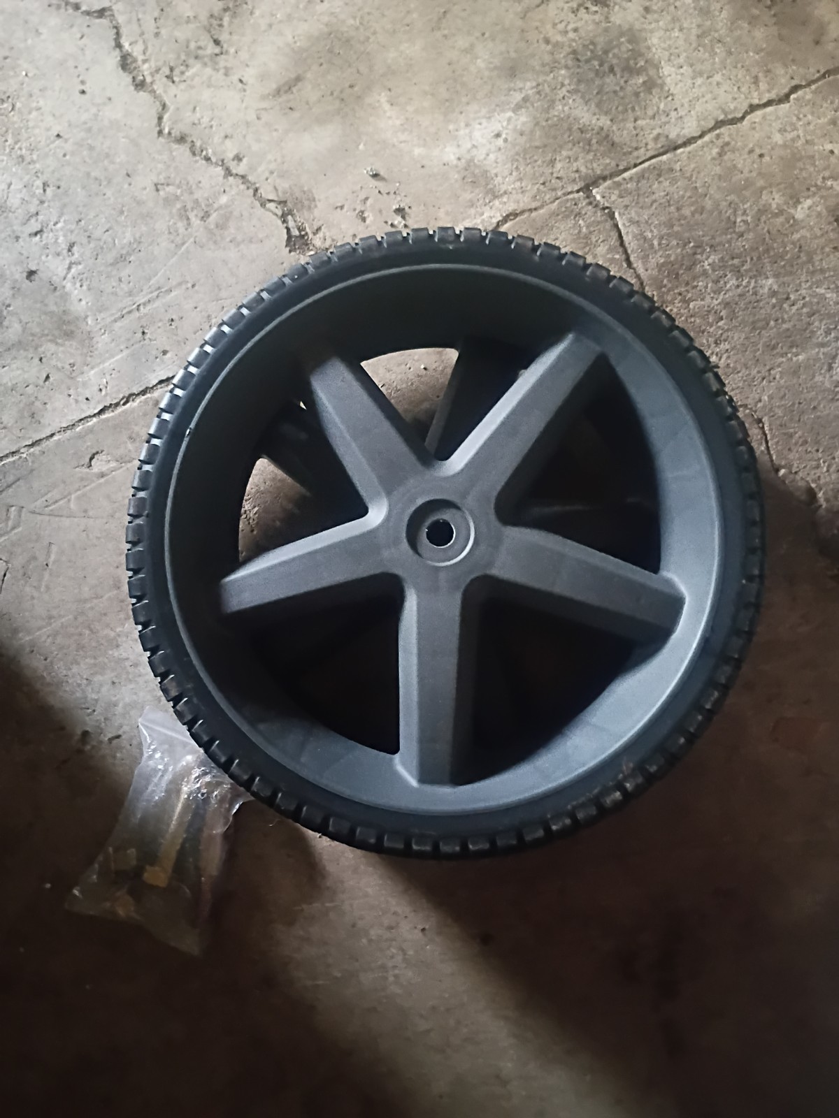 12″ plastic wheel for pressure washer, 2″ thick with 1/2″ hole for axle, used