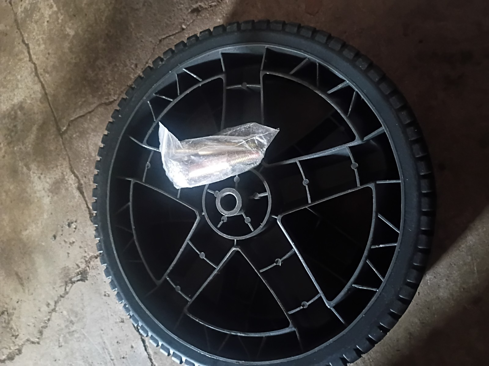 12″ plastic wheel for pressure washer, 2″ thick with 1/2″ hole for axle, used