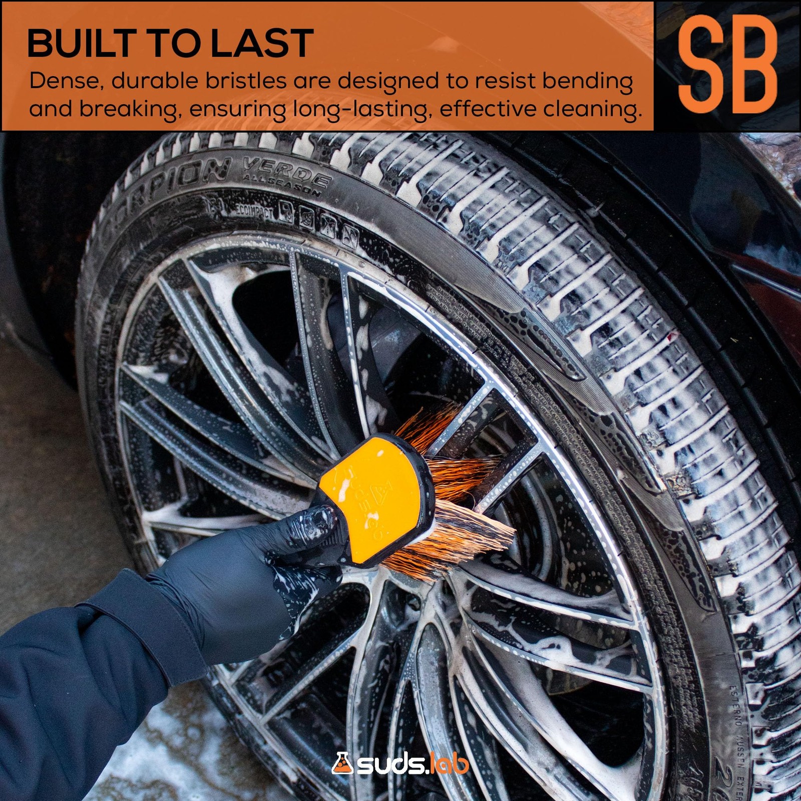 Suds Lab Wheel Spoke Brush Rubberized Handle Soft Bristle Black and Orange
