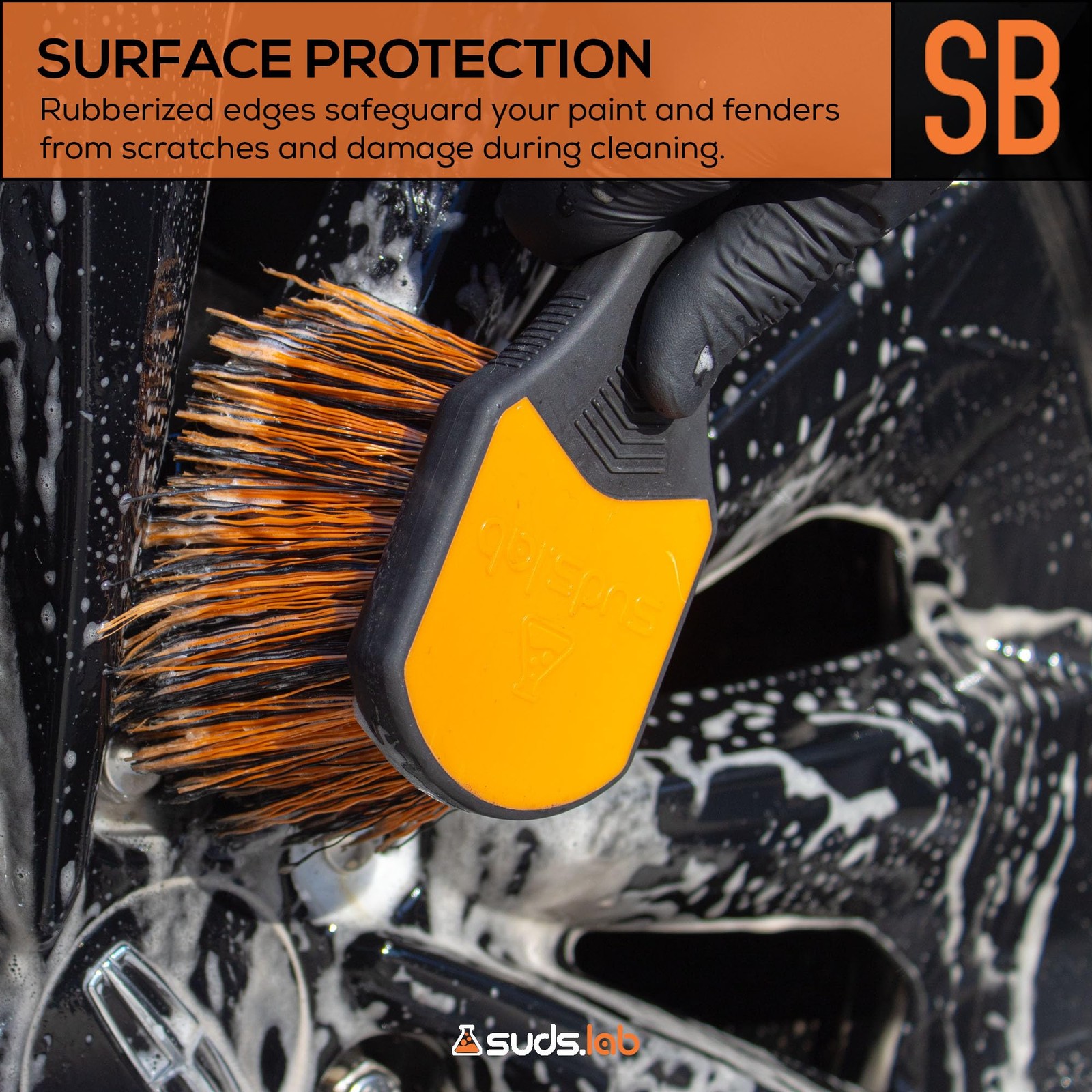 Suds Lab Wheel Spoke Brush Rubberized Handle Soft Bristle Black and Orange